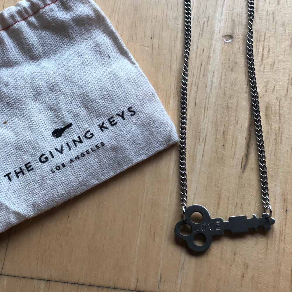 Giving Key Necklace with original bag